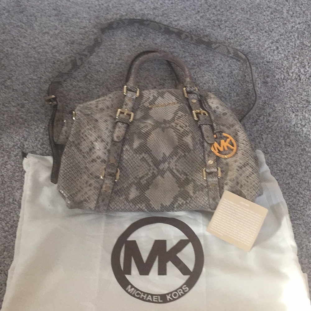 Michael Kors leather snakeskin purse.